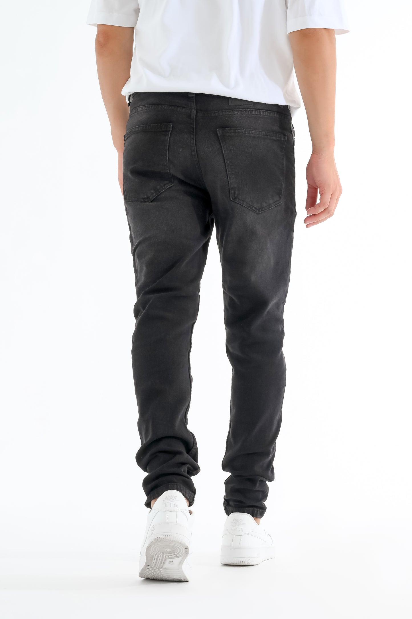 Black jeans with simple white touches