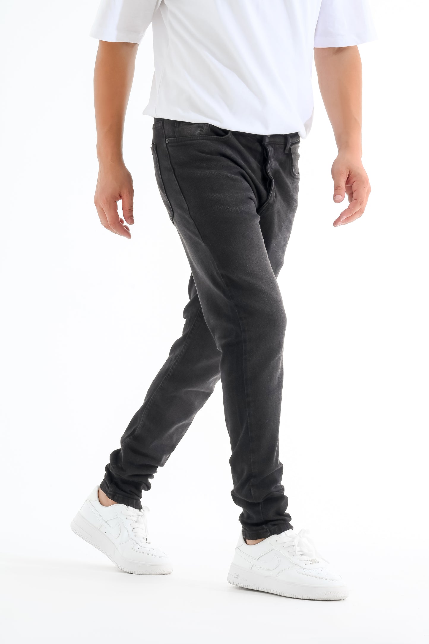 Black jeans with simple white touches
