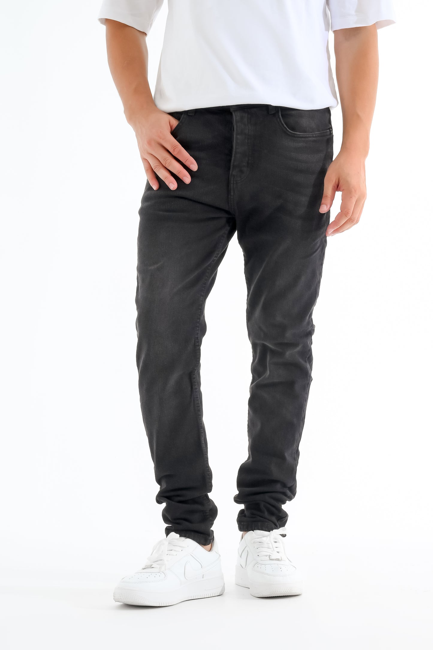 Black jeans with simple white touches